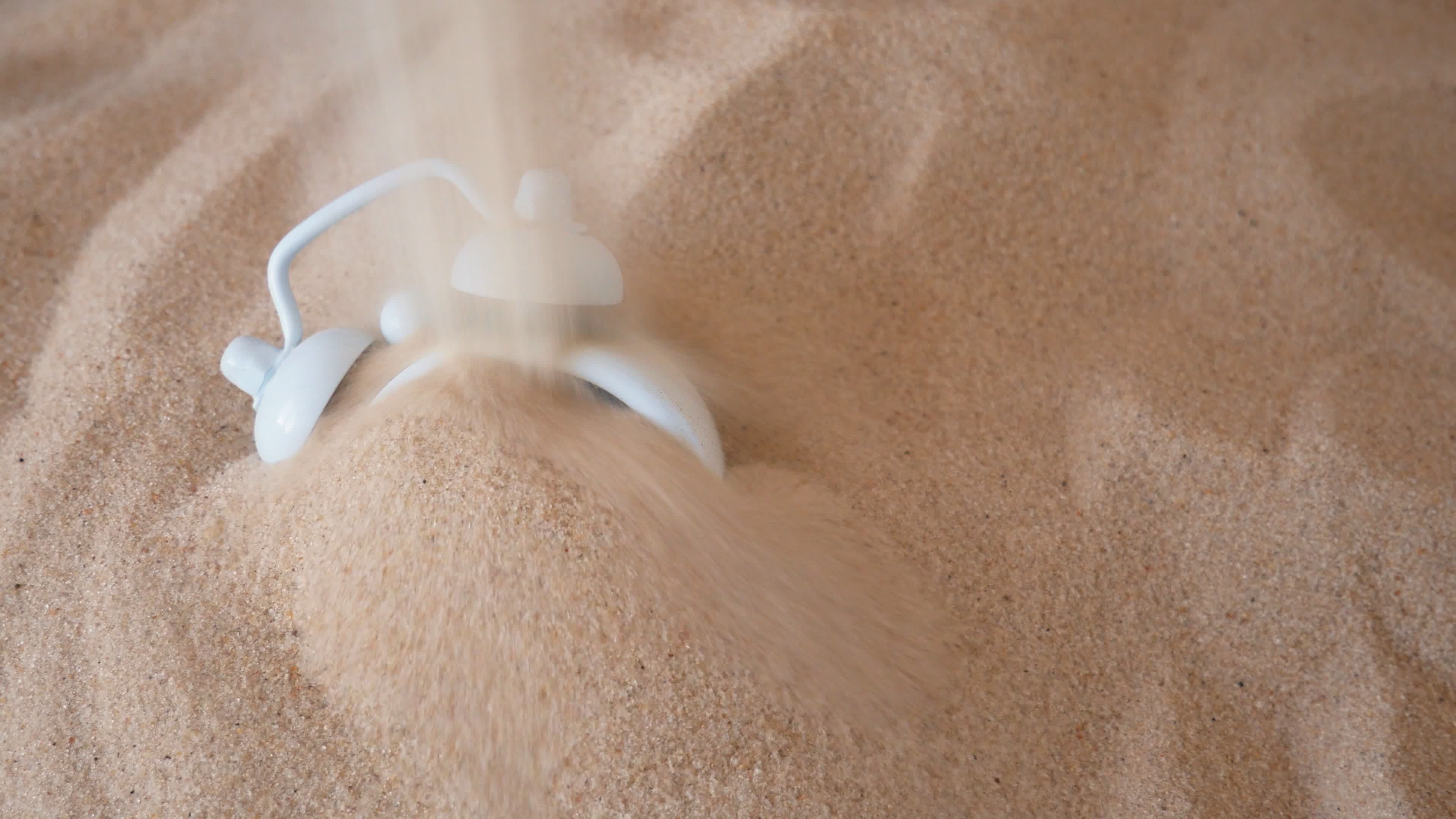 Sand falls on the clock. Countdown, the flow of life. The Concept Of