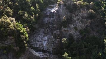 Aerial descending view next to a waterfall video