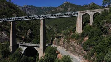 Aerial ascend view of bridges in mountains video