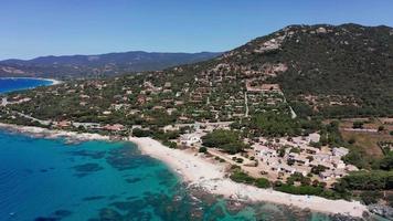 Aerial orbit view of sea coast with villas and beach video