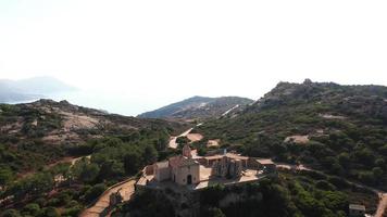 Aerial orbiting view left of Notre Dame della Serra near Calvi video