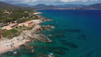 Aerial view of sea coast and rocky beach with hotel video