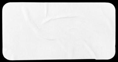 Crumpled paper sheet isolated on black background. Rectangle shape with rounded edges. Template mockup photo