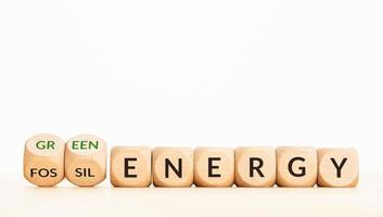 Change from fossil energy to green energy concept. Text on wooden blocks. Copy space photo