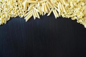 dark wooden pasta background, grocery poster, food illustration, top view photo