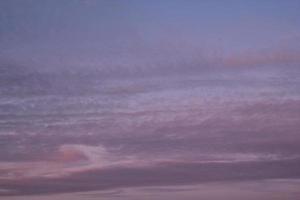Colourful cloudy twilight beautiful sky cityscape sunset and morning sunrise. Dramatic evening night early morning view. Panoramic nature background concept. Copy space for text. World environment day photo