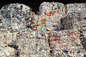 Stack of cardboard carton packed pile prepare for recycling on plant. Eco-friendly lifestyle zero waste concept. Environmental conversation technology. Garbage sorting. Ecology reuse green world idea. photo