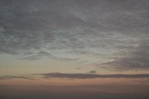 Colorful cloudy twilight beautiful sky cityscape sunset and morning sunrise. Dramatic evening night early morning view. Panoramic nature background concept. Copy space for text. World environment day photo