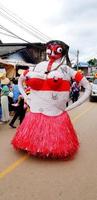 Loei, Thailand - February 6, 2023 Phi Ta Khon or Ghost festival. Local people wearing in female ghost showing performance for celebration culture, parade or Religious traditional photo