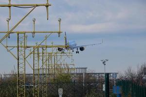 commercial airplane entrance to an airport, airport entrance signs, airport entrance lights photo