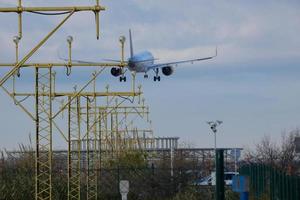 commercial airplane entrance to an airport, airport entrance signs, airport entrance lights photo