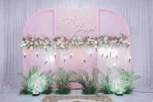 Wedding backdrop with simple flowers decoration photo