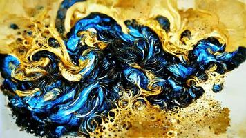 Abstract illustration alcohol ink with gold and blue color on marble photo