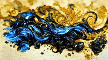 Abstract illustration alcohol ink with gold and blue color on marble photo