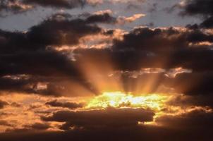 Cloudy sky at sunset photo