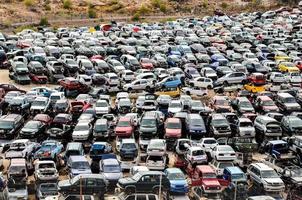 Abandoned cars in the junkyard photo