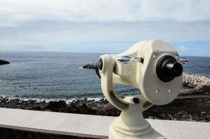 Binoculars overlook the ocean photo