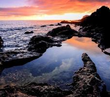 Sunset over the sea photo