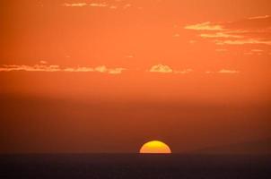 Sunset over the sea photo