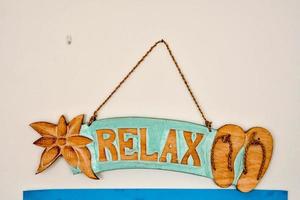 Relax sign on the wall photo