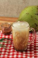 Es Kelapa Gula Merah, Young Coconut Ice with Palm Sugar photo