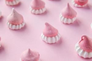 Scattered pink and white decor for baking, meringue , a place to advertise a pastry chef photo