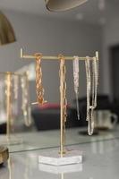 costume jewelry and jewelry on a stand photo