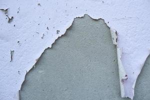 peeling off house wall paint background photo