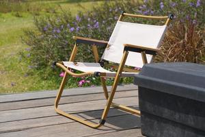 Camping chair on old wooden floor photo