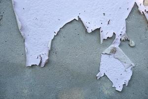 peeling off house wall paint background photo