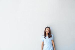 Happy Asian woman in a coffee shop text input background photo