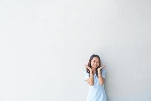 Happy Asian woman in a coffee shop text input background photo