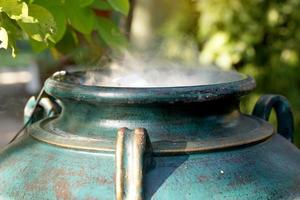 fog machine or automatic smoke in a clay jar add beauty Add dimension, look cool, decorate rooms and gardens both indoor and outdoor. soft and selective focus. photo