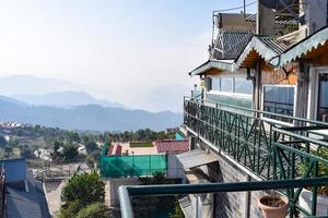 Early morning view of Modern rooftop restaurant at Kasauli, Himachal Pradesh in India, View of mountain hills from open air restaurant in Kasauli, Kasauli Rooftop restaurant photo