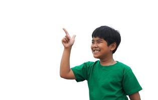 The boy smiled and pointed his hand to his side. on a white background photo