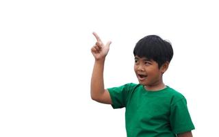 The boy smiled and pointed his hand to his side. on a white background photo