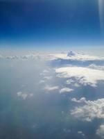 Blue sky with clouds background photo