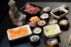 different Kinds of asia seafood sushi on a slate photo