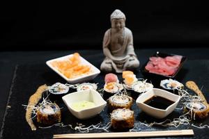 different Kinds of asia seafood sushi on a slate photo