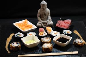 different Kinds of asia seafood sushi on a slate photo