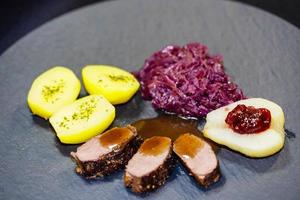 saddle of venison with herbs and spices photo