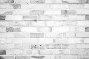 Full frame shot of white concrete wall textured and background. A concrete wall is a wall constructed of concrete blocks of uniform size. photo