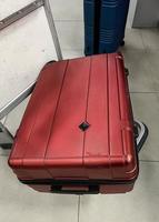 Red Broken Suitcase photo