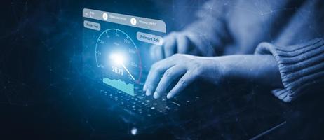 Fast internet connection with Metaverse technology concept, Hand holding smartphone and Virtual screen of Internet speed measurement,Internet and technology concept, 5G Hi speed internet concept photo