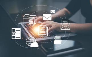Man Hand of unrecognizable man using interactive electronic documents interface. Concept of hi tech and future of business, computer folder document. Business management, big data,finance technology. photo