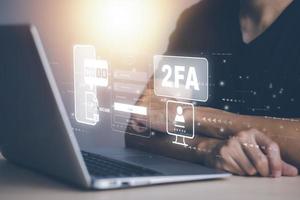Businessman with Cybersecurity privacy protect data. 2FA internet network security technology, Two Factor Authentication, Cyber Security privacy protect data, Protection hacked connections. photo