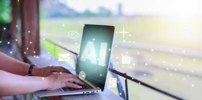 woman using Laptop with Artificial Intelligence AI,on big data network machine learning and data on the dark background, artificial intelligence technology, innovation and futuristic,working outside photo