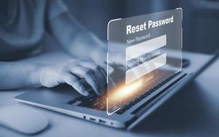 cyber security and reset password login online concept  Hands typing and entering username and password of social media, log in with smartphone to an online bank account, data protection from hacker photo