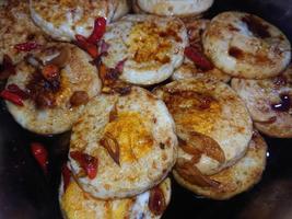 Scrambled eggs smeared with soy sauce and topped with sliced red chilies. Simple cooking. Indonesian food photo