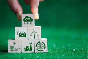 Net zero greenhouse gas emissions reduction with carbon credit concept. Reduce carbon dioxide e.g. renewable energy production improve the efficiency of transportation reduce environmental pollution. photo